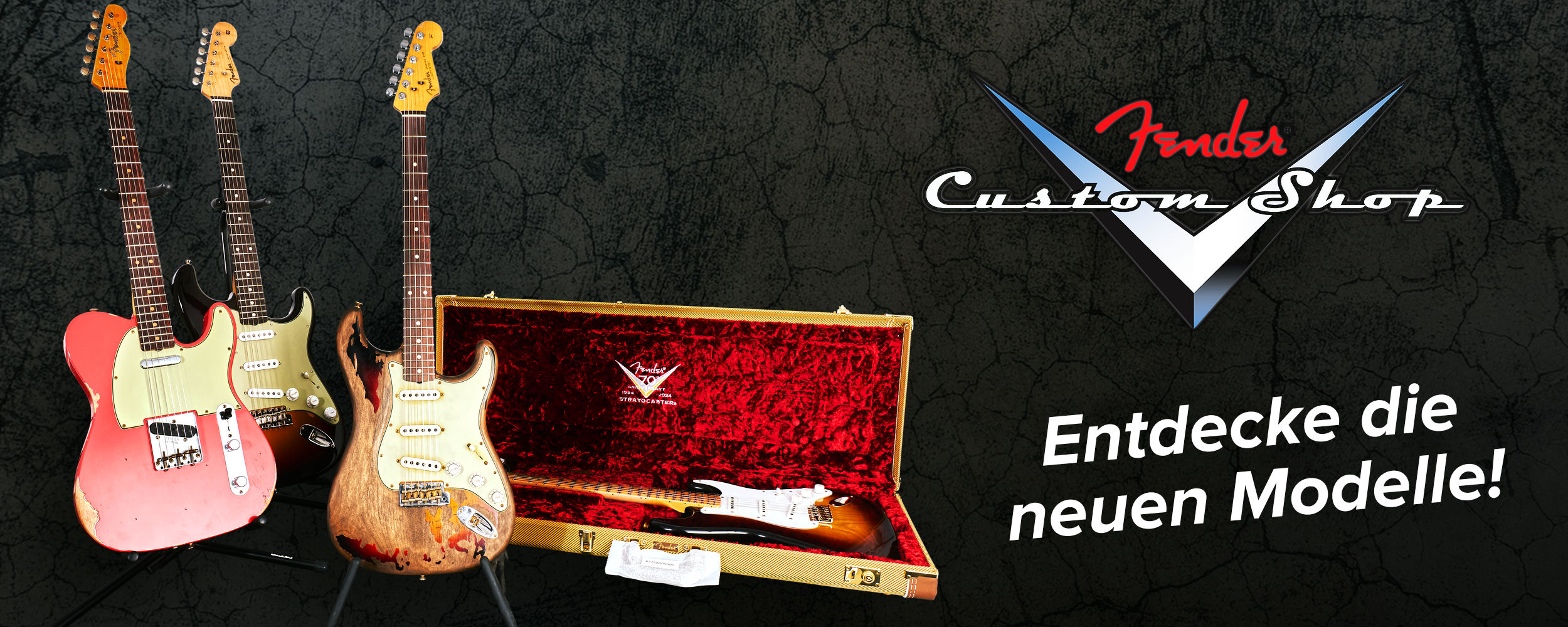 Fender Custom Shop Banner mit mehreren E-Gitarren und Gitarrenkoffer vor dunklem Hintergrund, Text: ‚Entdecke die neuen Modelle!‘
